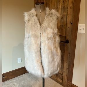 White faux fur vest
